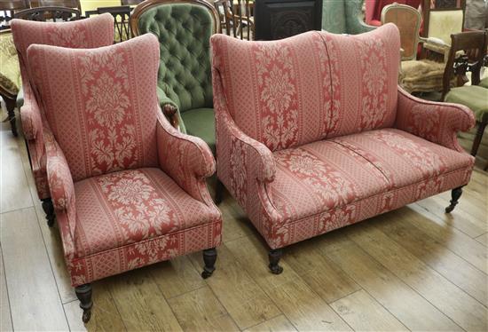 An Edwardian three piece salon suite sofa W.116cm